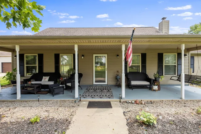 a view of a building with sitting area
