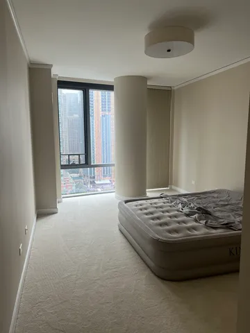 a view of a livingroom with a staircase