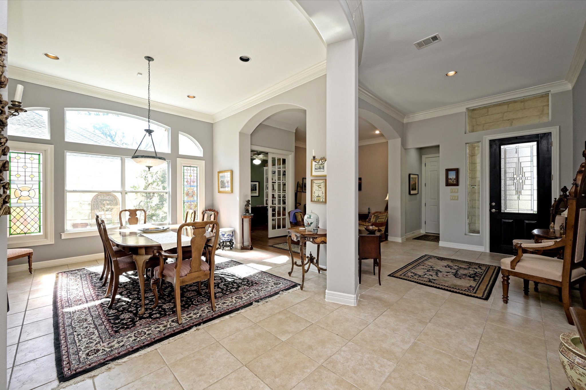 4912 Interlachen Lane Austin, TX 78747 - Photo 5 of 39 a view of a dining room with furniture window and outside view