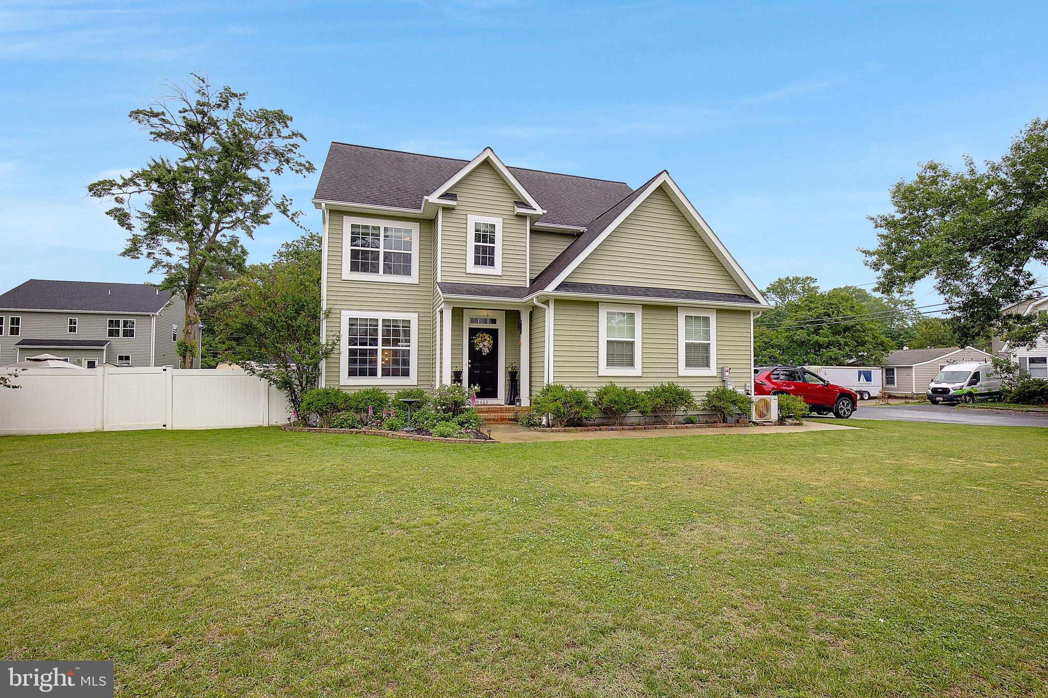 403 Venton Road Edgewater, MD 21037 - Photo 46 of 62 a front view of a house with garden
