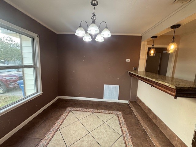 3126 Westgard Street Corpus Christi, TX 78415 - Photo 7 of 10 a view of a room with a large window and chandelier