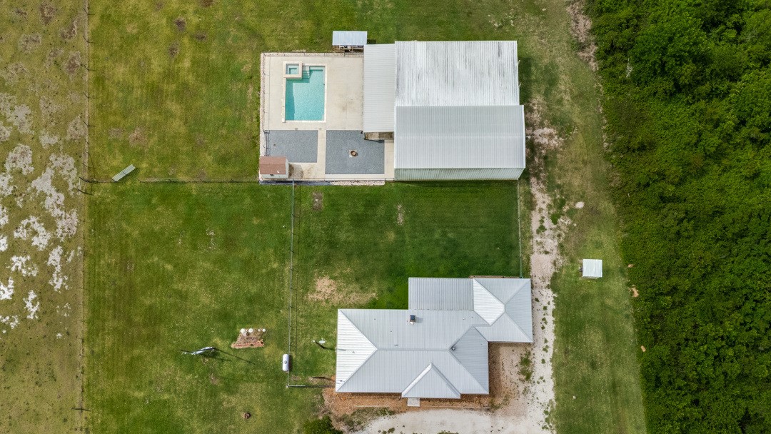 2500 County Road 62 Rosharon, TX 77583 - Photo 48 of 48 an aerial view of a house with a garden