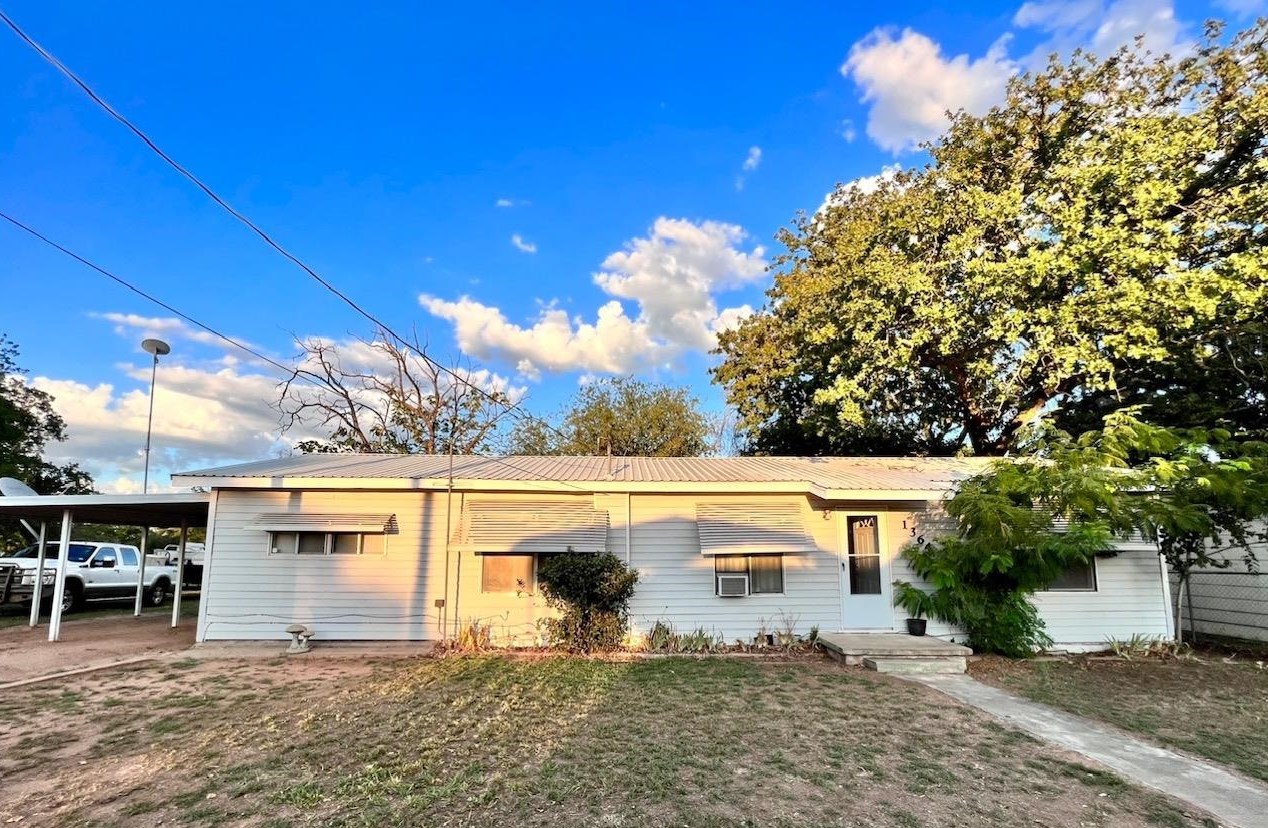 a view of a house with a patio