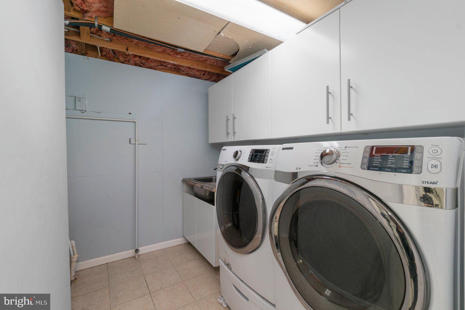 4018 Rustico Road Baltimore, MD 21220 - Photo 18 of 20 Laundry With Front Loading Washer & Dryer