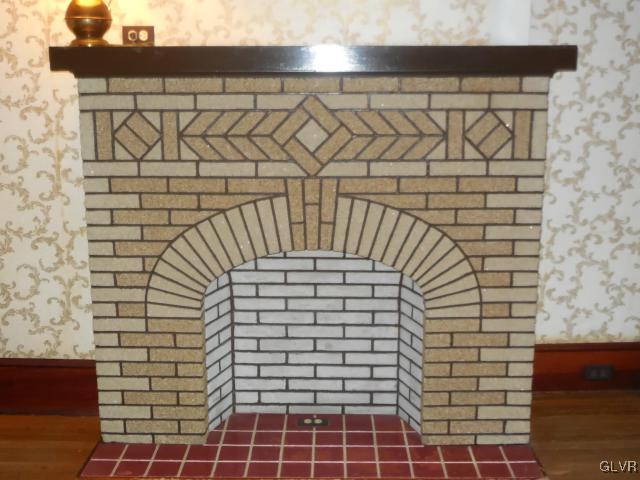 2020 Stocker Mill Road Easton, PA 18045 - Photo 17 of 36 brick ornamental fireplace in living room