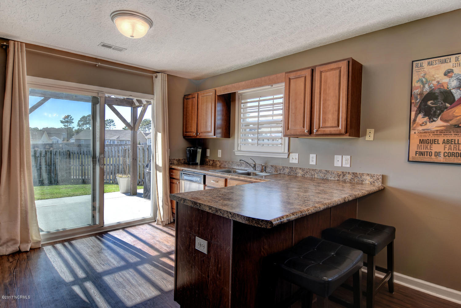 320 Rose Bud Lane Holly Ridge, NC 28445 - Photo 11 of 36 Bar stool space in kitchen