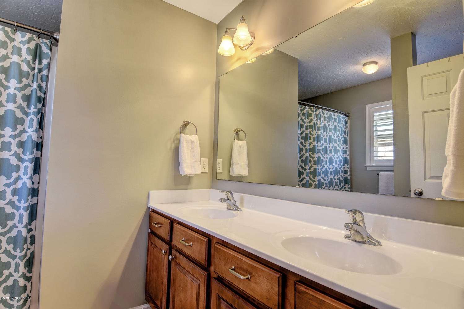 320 Rose Bud Lane Holly Ridge, NC 28445 - Photo 22 of 36 Dual sinks in master bath