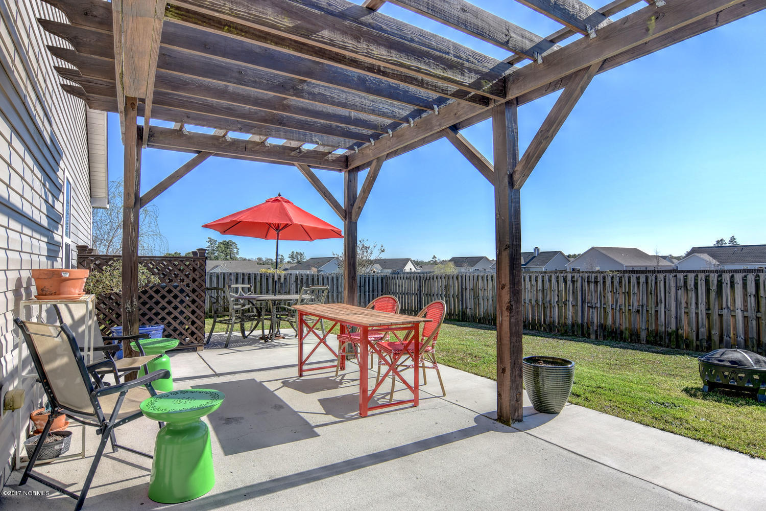 320 Rose Bud Lane Holly Ridge, NC 28445 - Photo 28 of 36 Large concrete patio