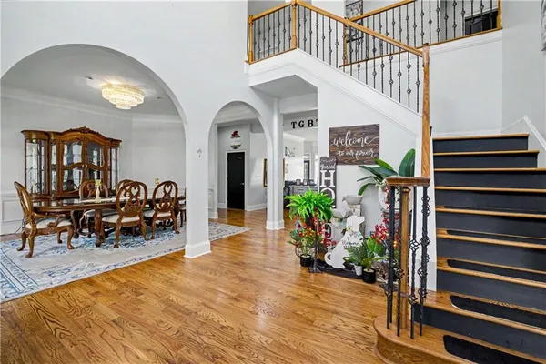 a living room with fireplace furniture and a flat screen tv