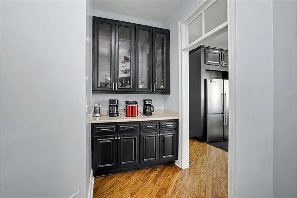 a view of kitchen and utility room with closet