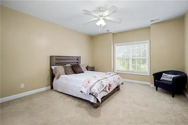 an aerial view of a residential houses with outdoor space