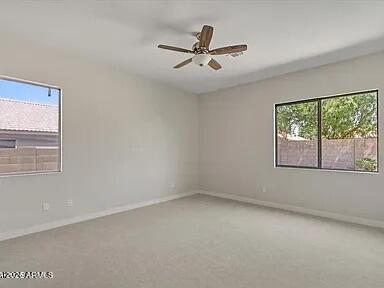 2918 East Harwell Road Gilbert, AZ 85234 - Photo 12 of 12 an empty room with a window