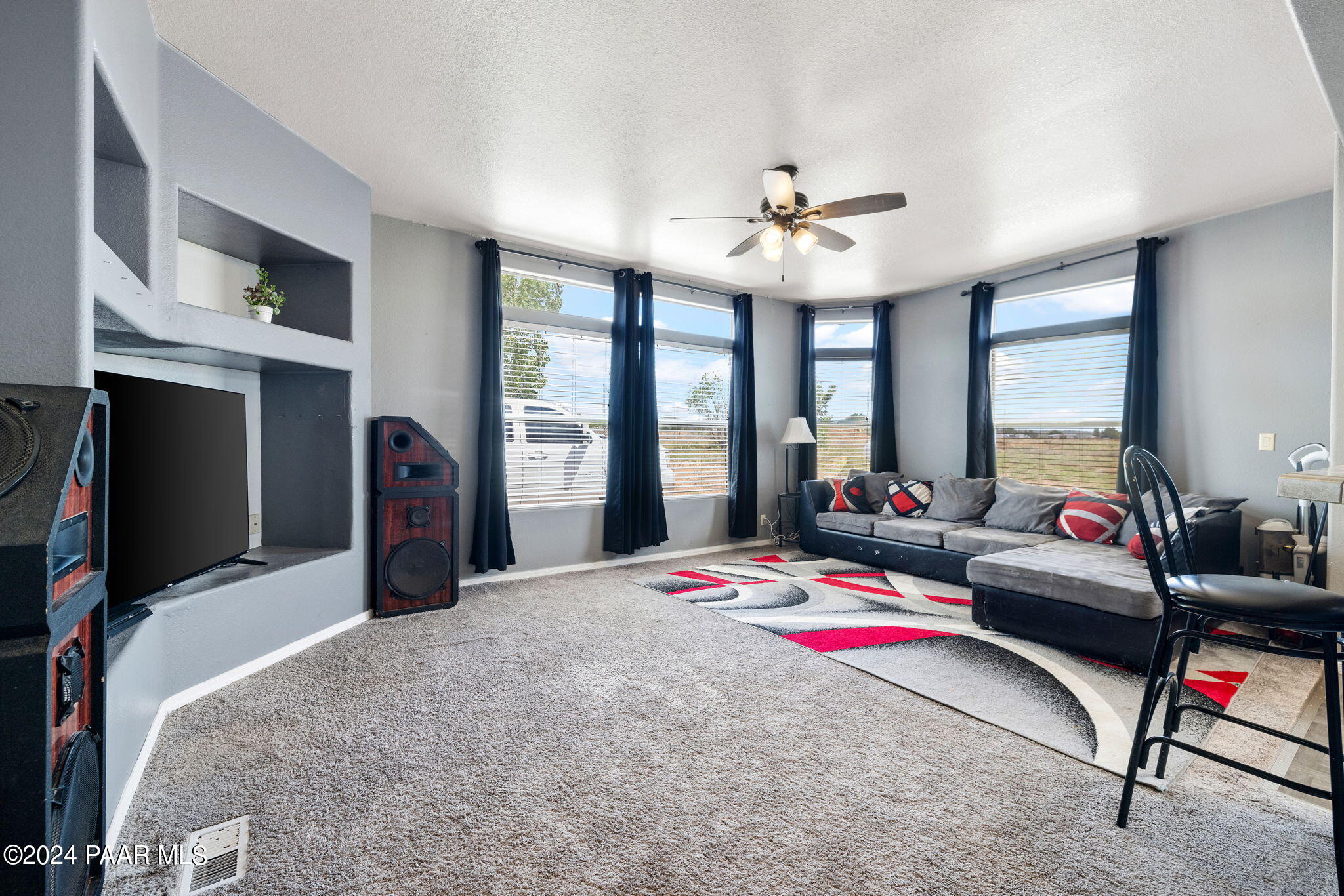 24851 North Mitchell Road Paulden, AZ 86334 - Photo 22 of 38 a bedroom with a bed closet and a window