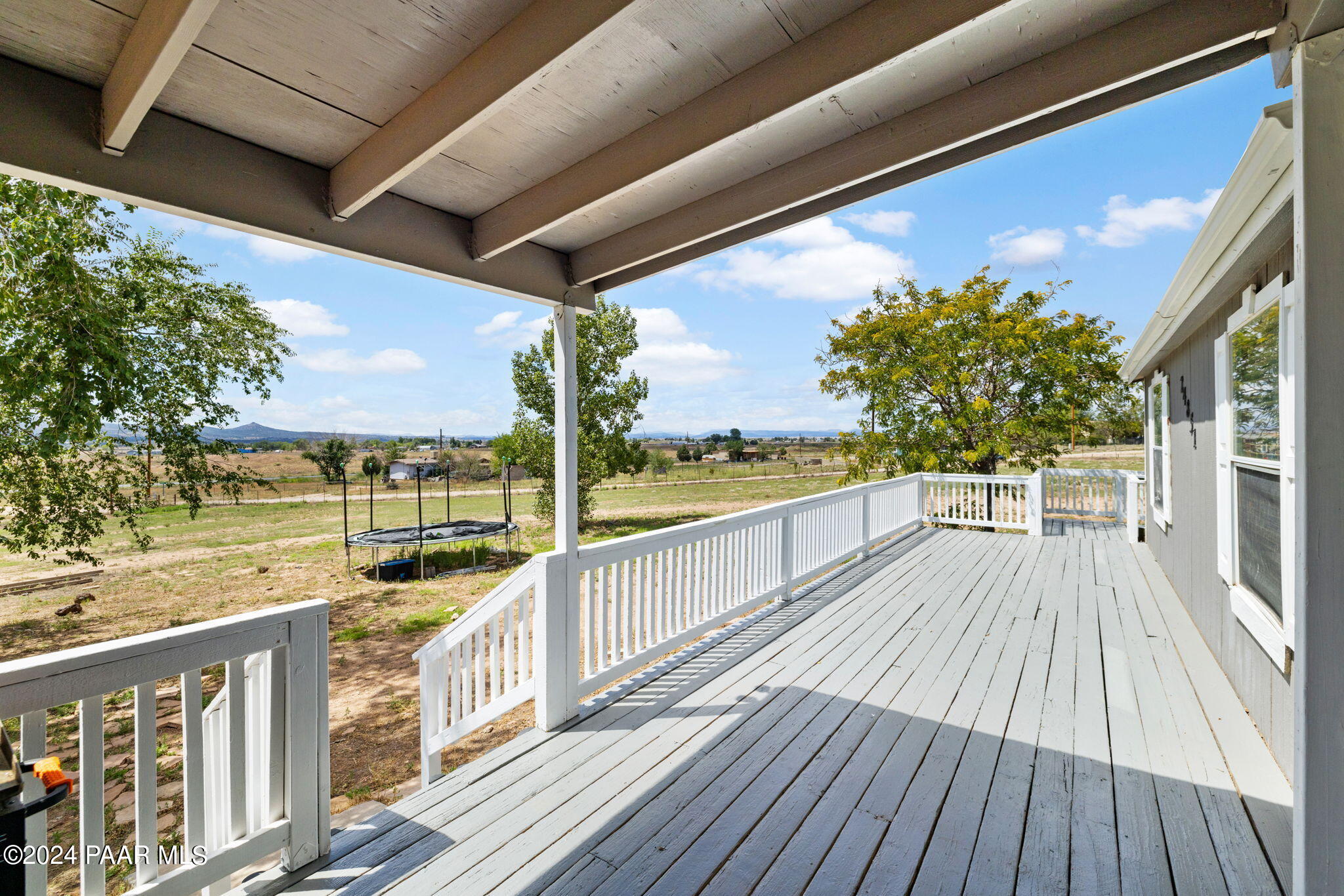 24851 North Mitchell Road Paulden, AZ 86334 - Photo 8 of 38 a view of a balcony with wooden floor