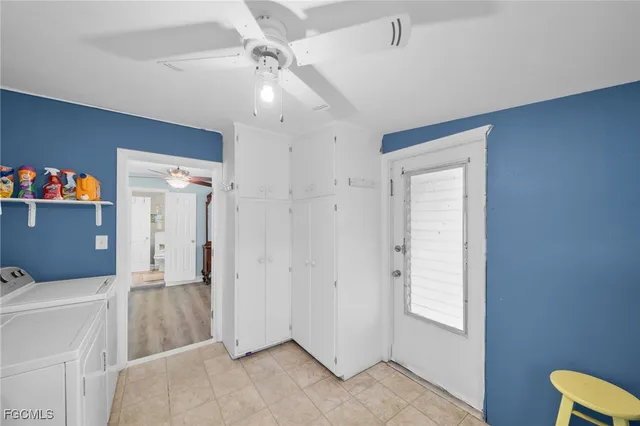 an aerial view of a house with a yard and fountain