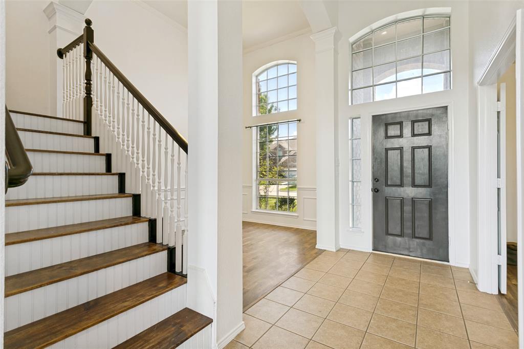 4107 Waverly Road Corinth, TX 76208 - Photo 2 of 30 Upon entering this home you will immediately notice the soaring ceilings, fresh, crisp white paint, and an abundance of natural light!