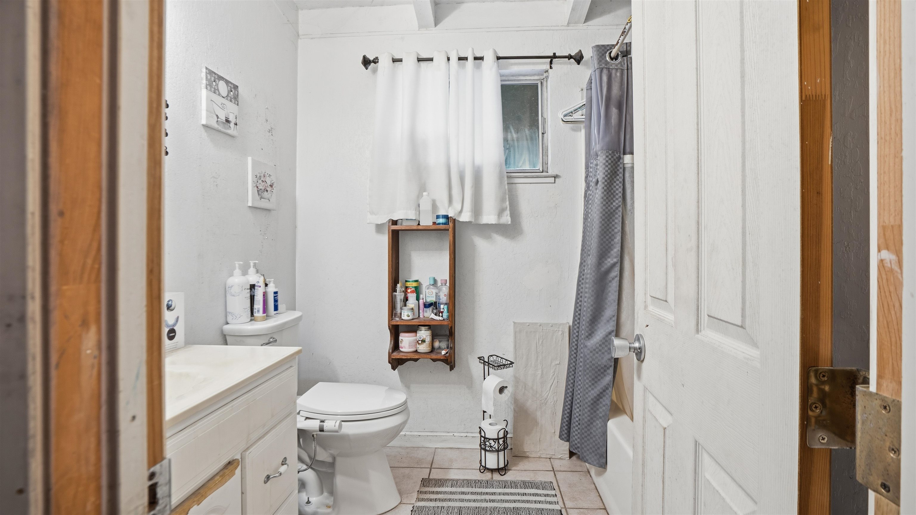 130 Sims Road Brentwood, CA 94513 - Photo 5 of 5 Full bathroom with a shower with curtain, vanity, and light tile patterned flooring