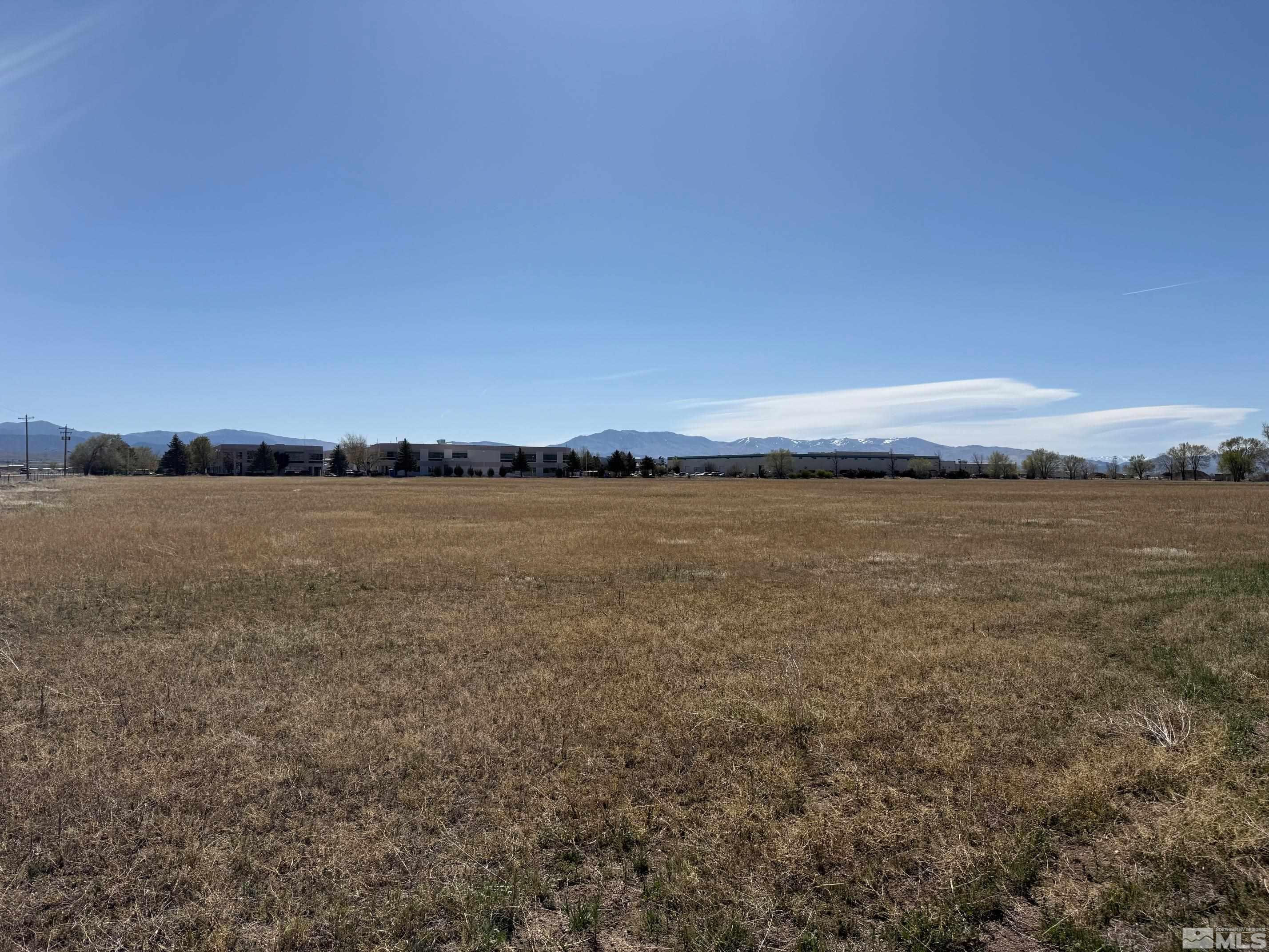 961 Airport Road Minden, NV 89423 - Photo 3 of 6 a view of a large body of water and mountain in the back