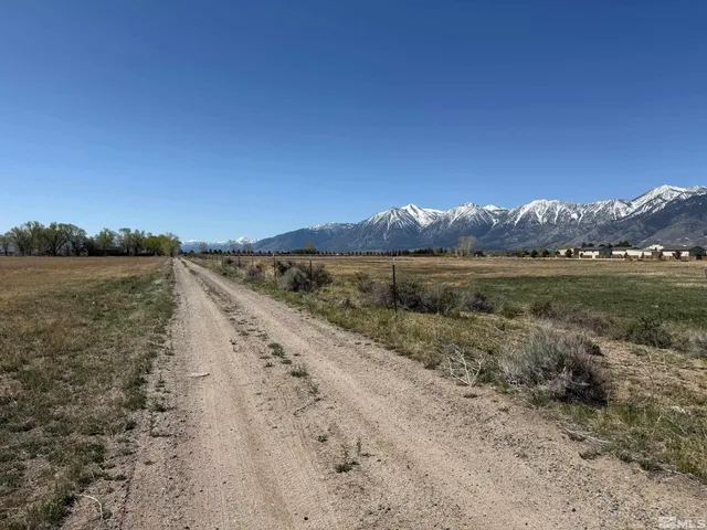 a view of mountain with lake view