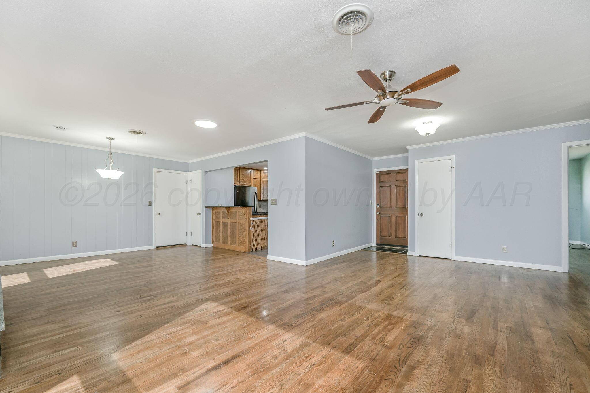 4305 Omaha Avenue Amarillo, TX 79106 - Photo 4 of 20 a view of an empty room with a window