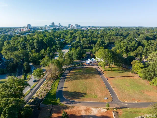 a view of a white building with a view of ocean