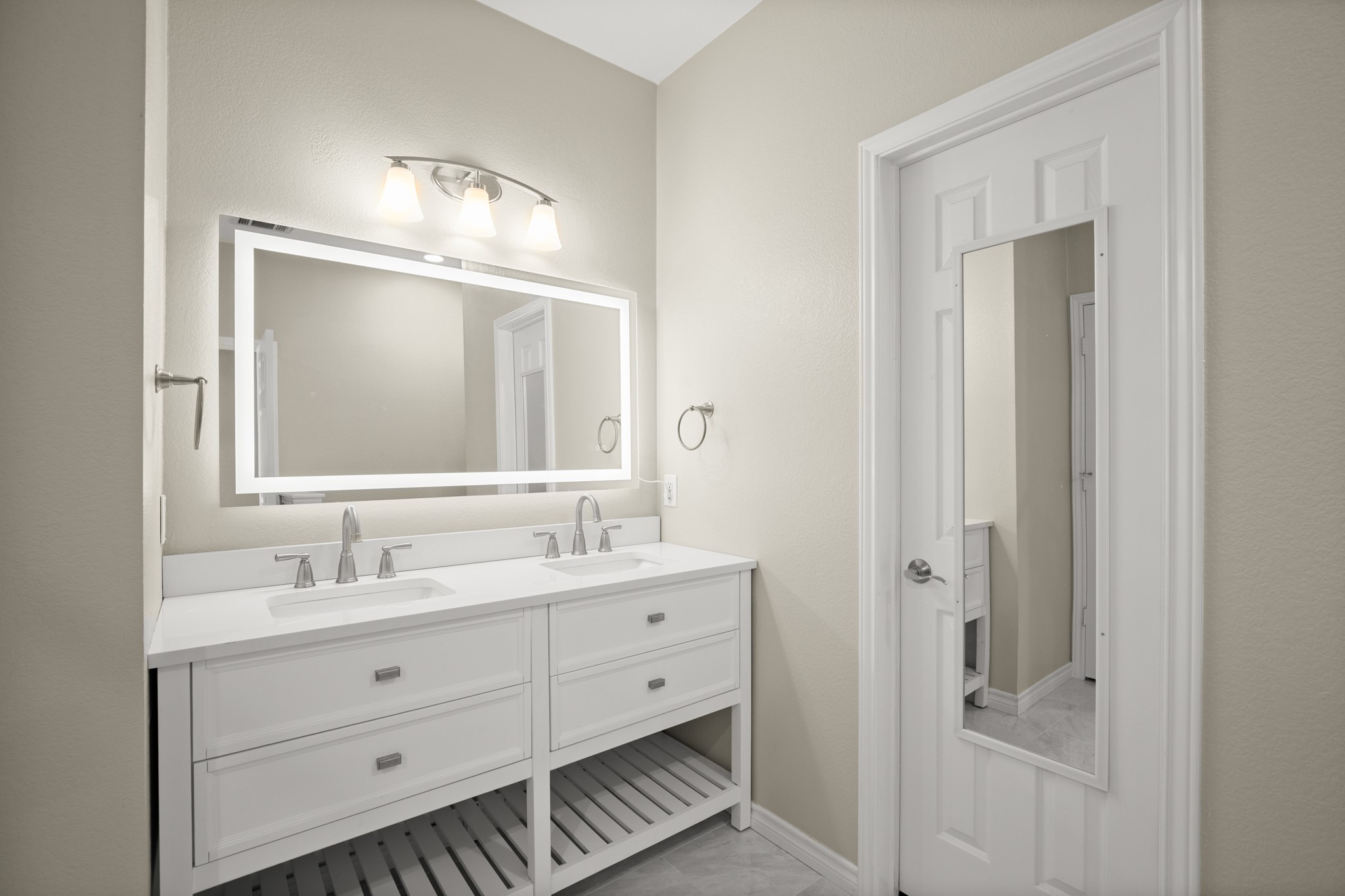 151 Sampson Kyle, TX 78640 - Photo 10 of 23 A double vanity always makes mornings run a little smoother.