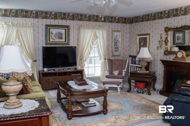 1504 North Cedar Street Foley, AL 36535 - Photo 10 of 16 Additional view of the family room with electric fireplace.