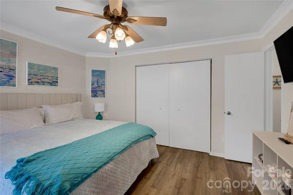 a view of a balcony with chair and glass door