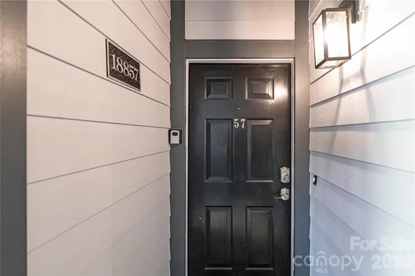 a kitchen with a stove and a microwave