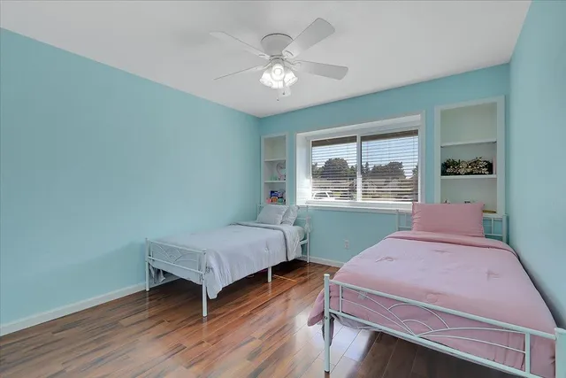 a bedroom with a bed and a closet