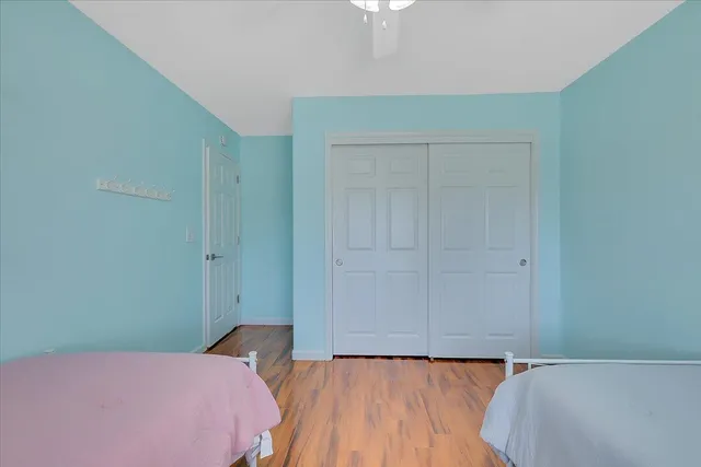 a utility room with cabinets washer and dryer