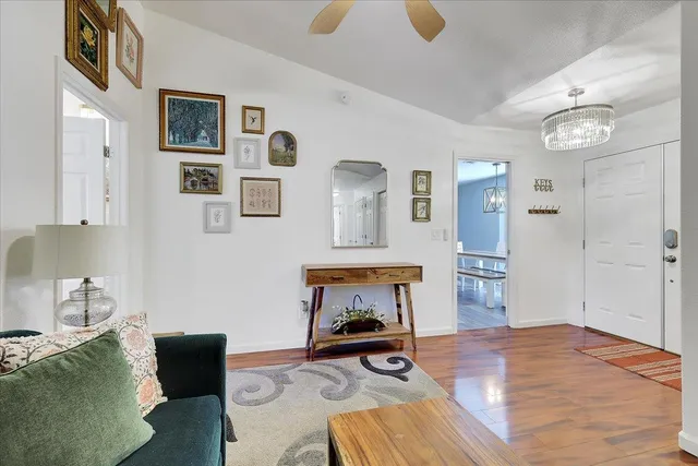 a bedroom with furniture and a window