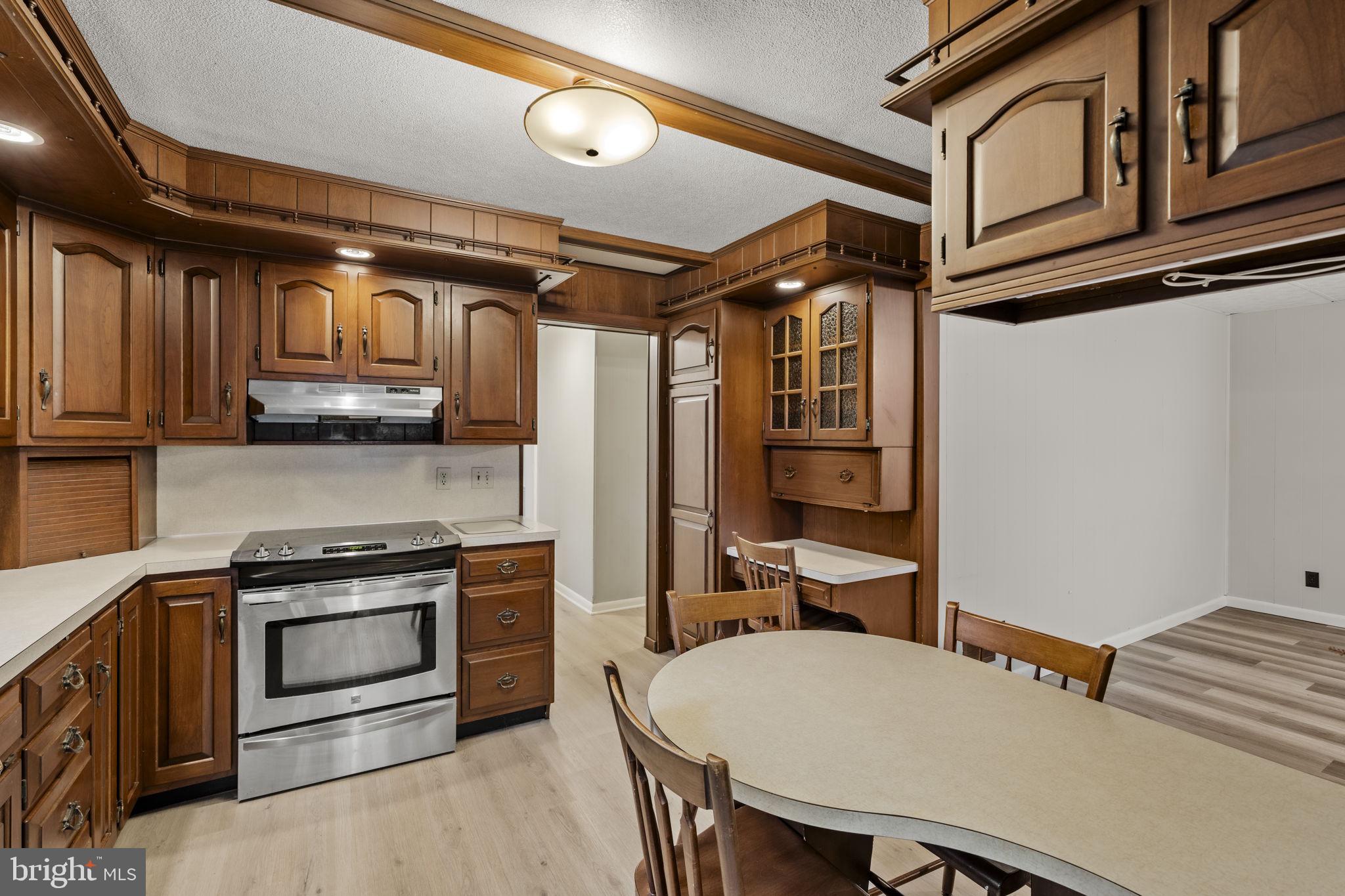 65 Compass Road Parkesburg, PA 19365 - Photo 30 of 61 Charming kitchen with rich wood accents.