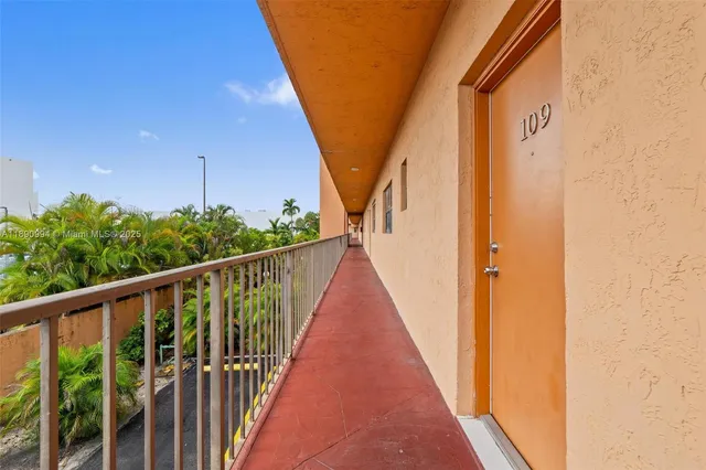 a view of a balcony with staircase