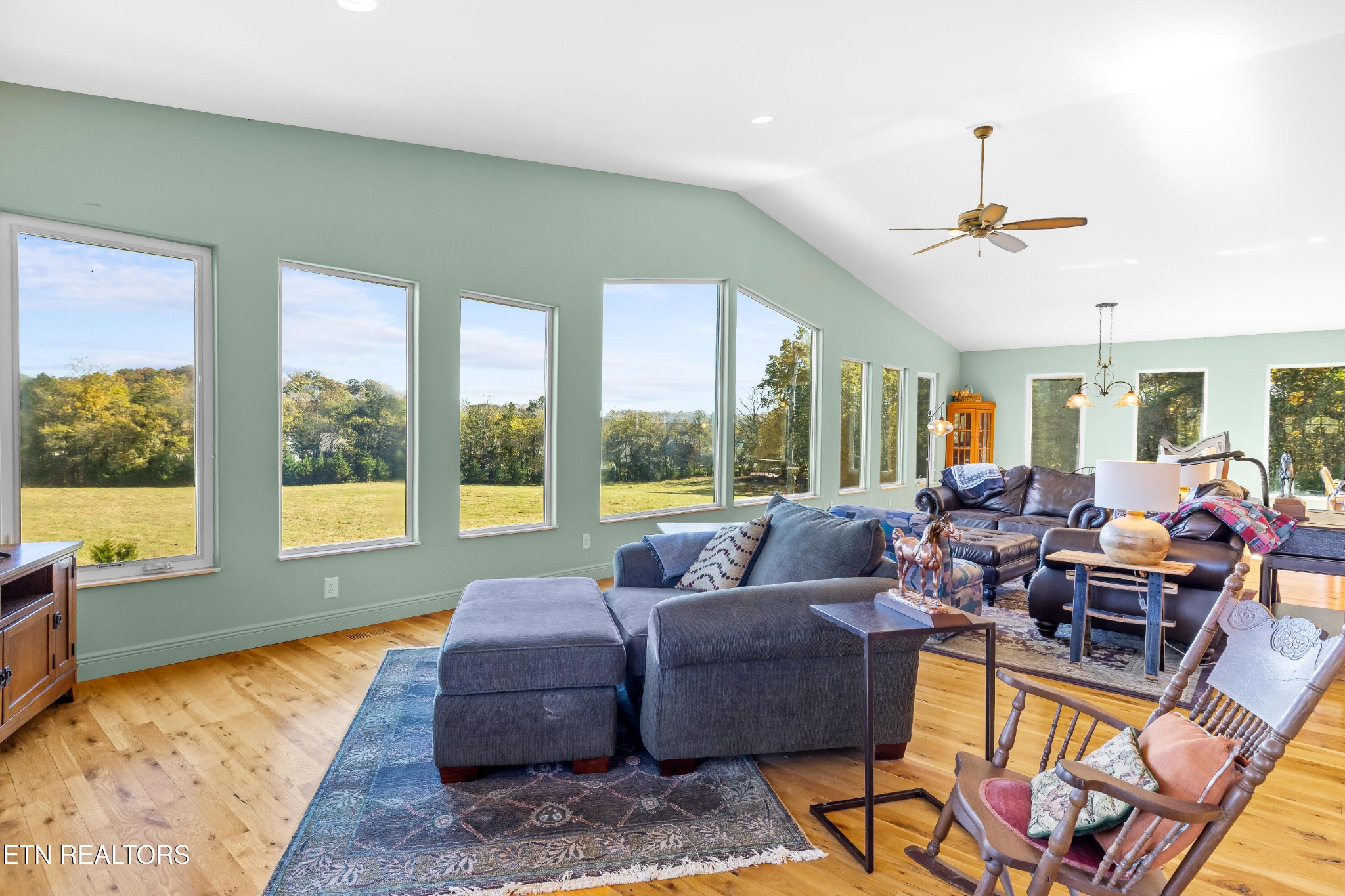 3070 West Fork Road Loudon, TN 37774 - Photo 16 of 48 a living room with furniture and a large window