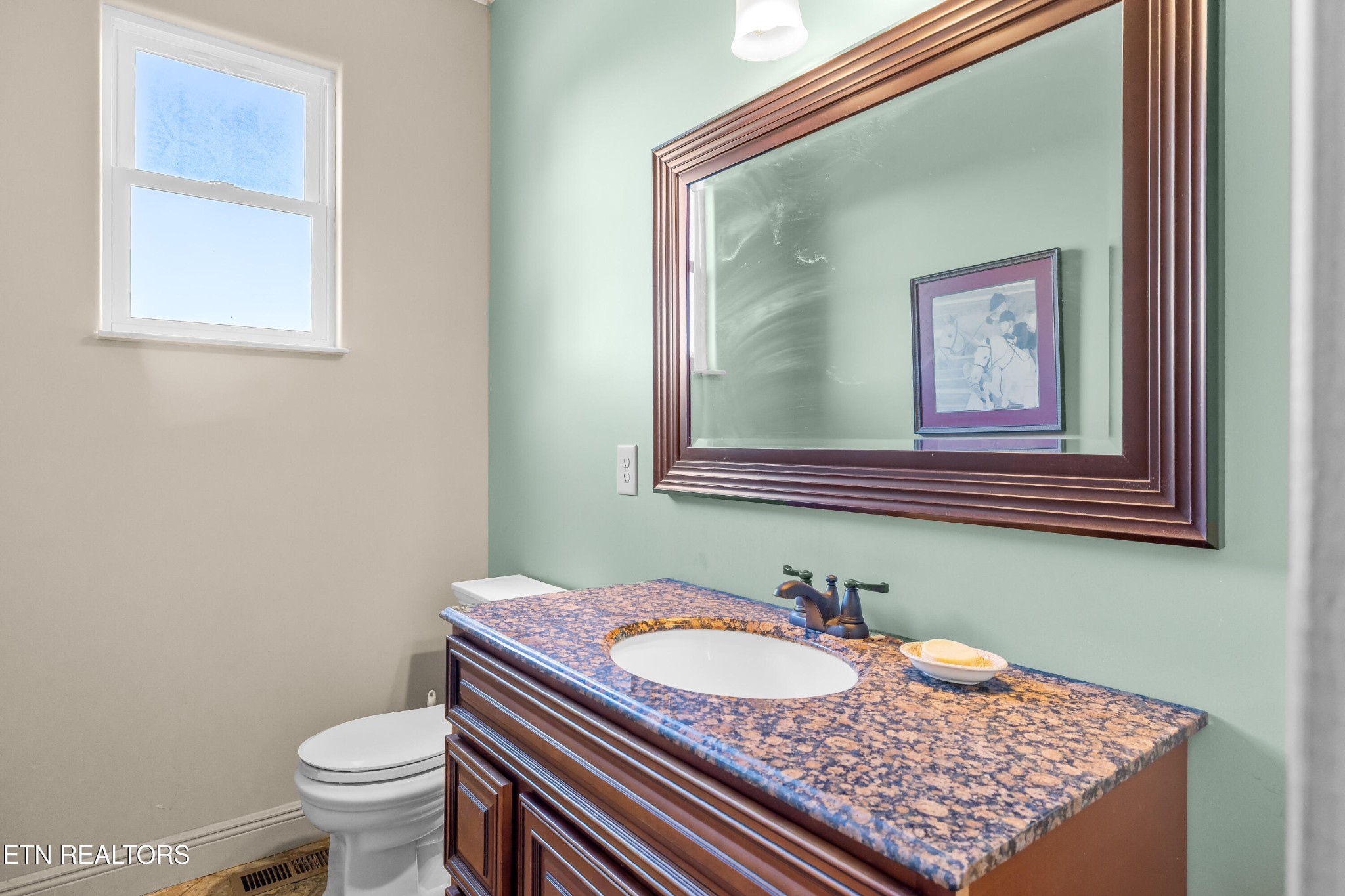 3070 West Fork Road Loudon, TN 37774 - Photo 23 of 48 a bathroom with a granite countertop sink and a mirror