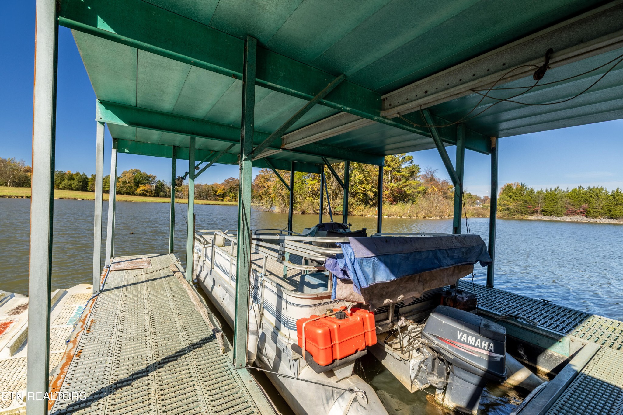 3070 West Fork Road Loudon, TN 37774 - Photo 45 of 48 a roof deck with a table and chairs