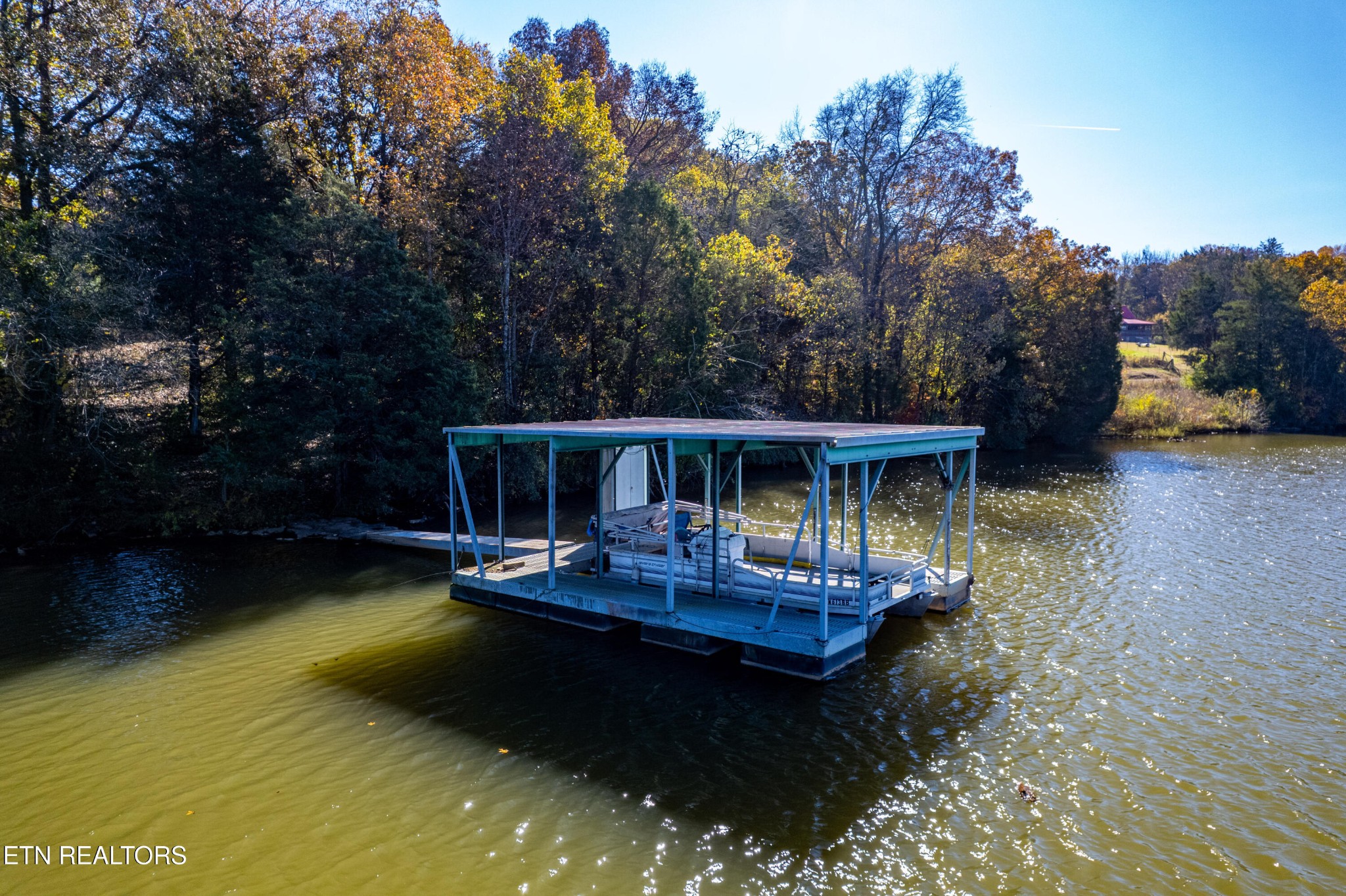 3070 West Fork Road Loudon, TN 37774 - Photo 46 of 48 a view of a swimming pool with lounge chairs