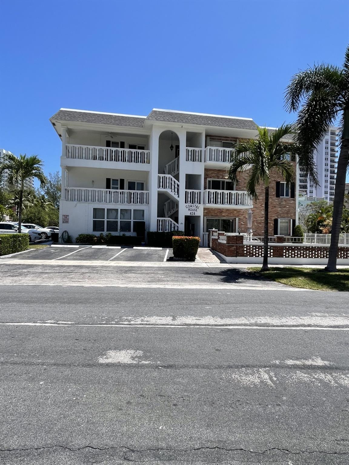 a view of a building with a street