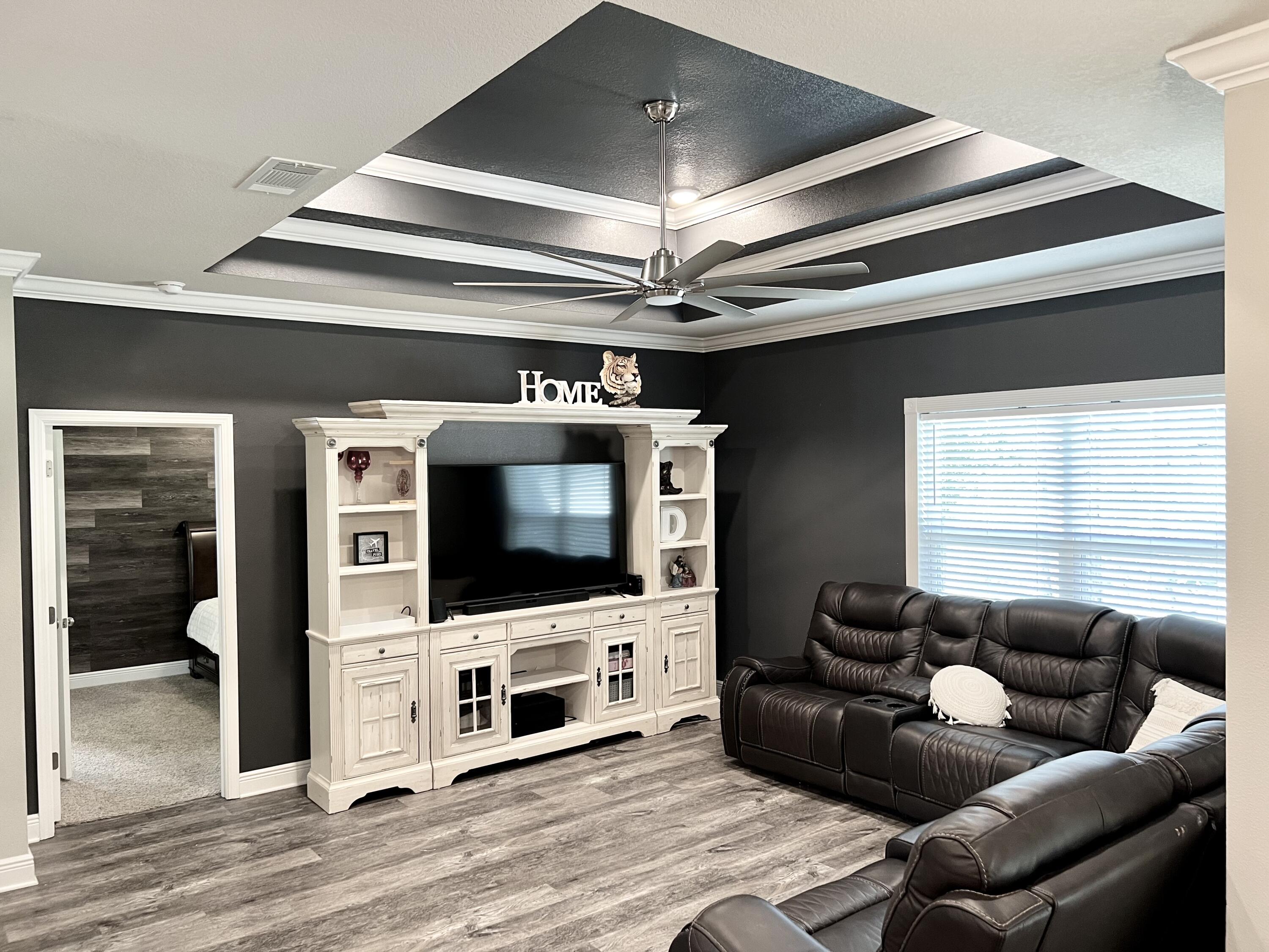 200 Stonegate Circle Santa Rosa Beach, FL 32459 - Photo 8 of 29 a living room with furniture and a flat screen tv