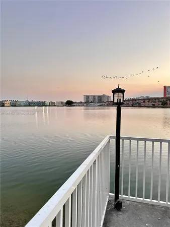 a view of a balcony next to a lake view