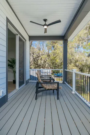 a view of a house with a backyard and a slide