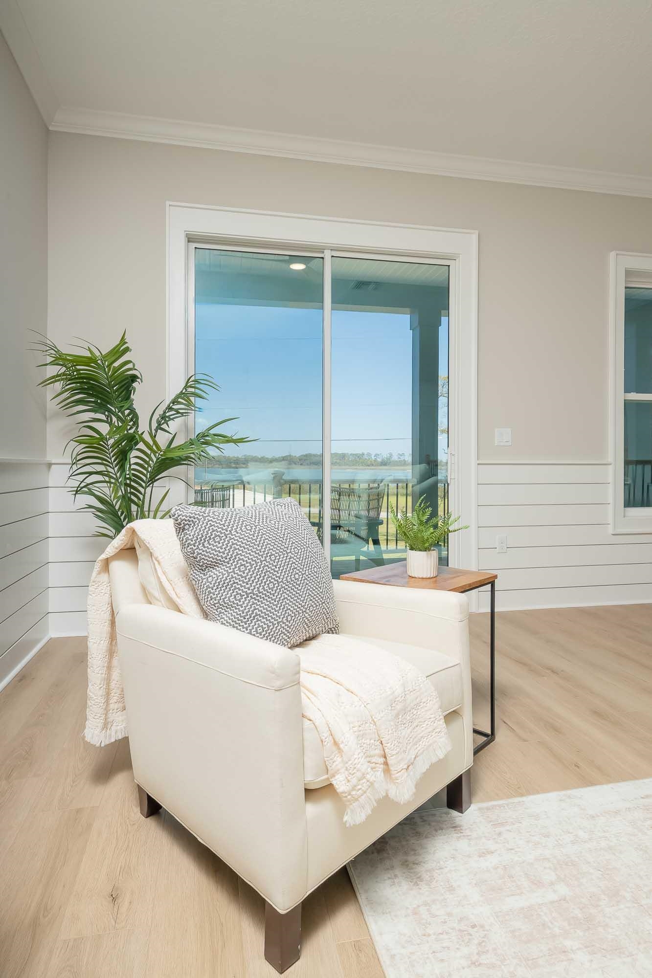 132 Terrapin Road St. Augustine, FL 32086 - Photo 29 of 95 a living room with furniture and a potted plant