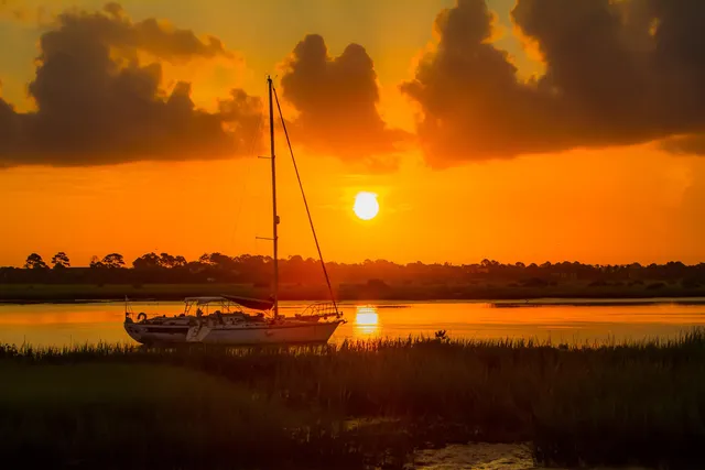 a bathroom with a shower sink and mirror