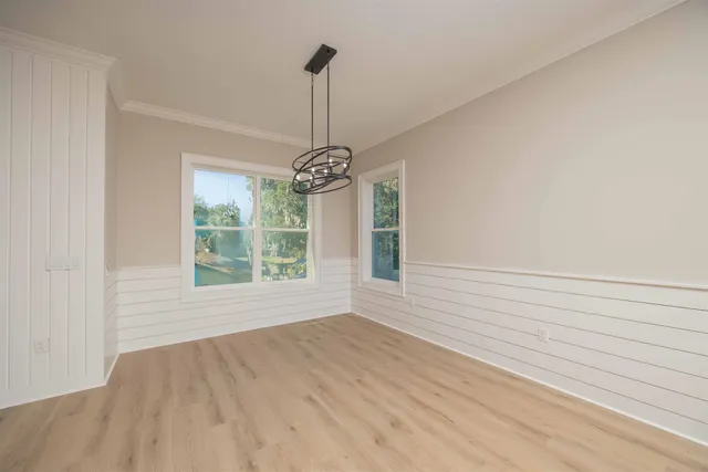 a view of small space with wooden floor