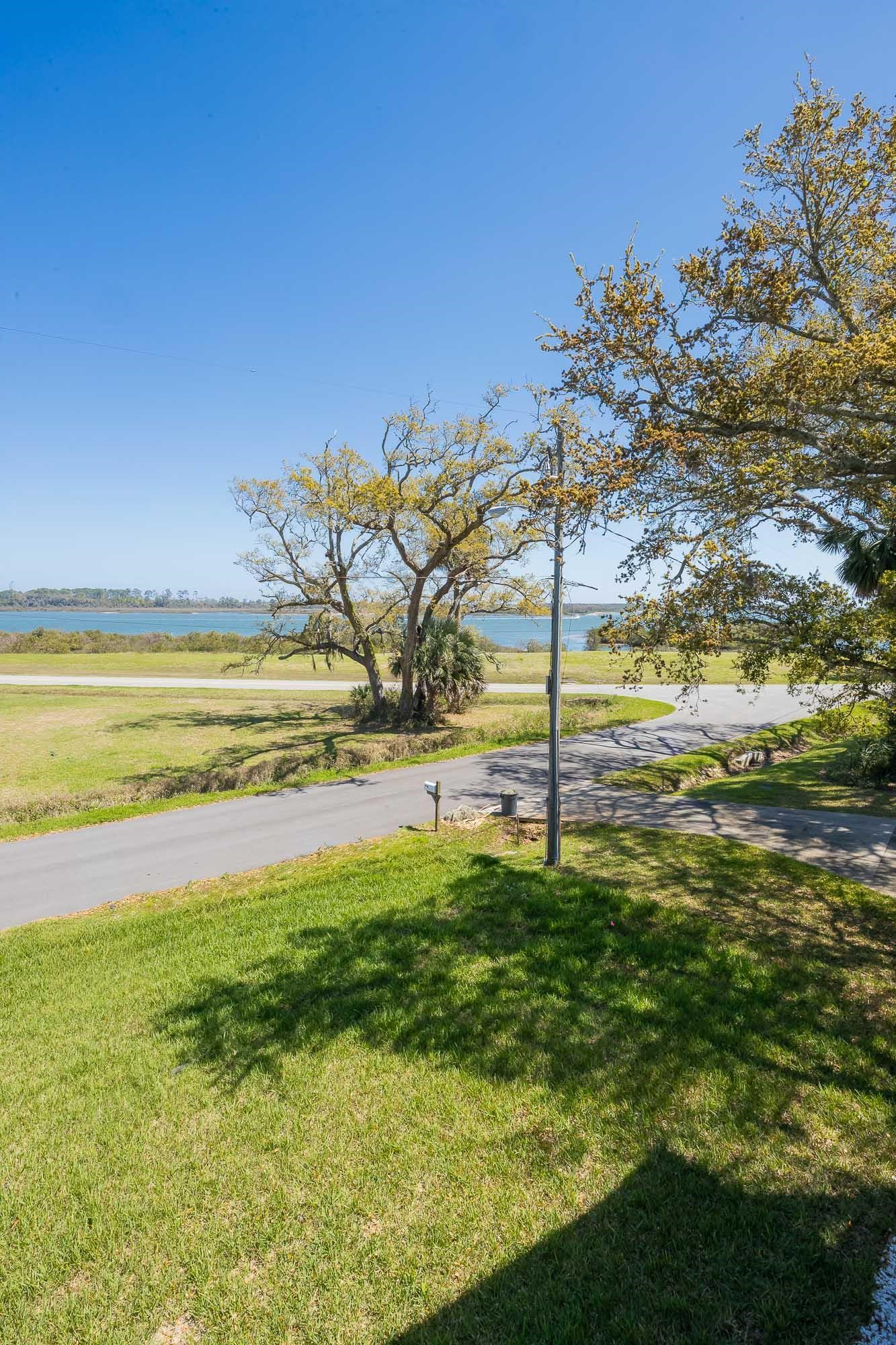 132 Terrapin Road St. Augustine, FL 32086 - Photo 34 of 95 a view of a garden with a house