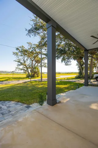 a view of swimming pool with seating space