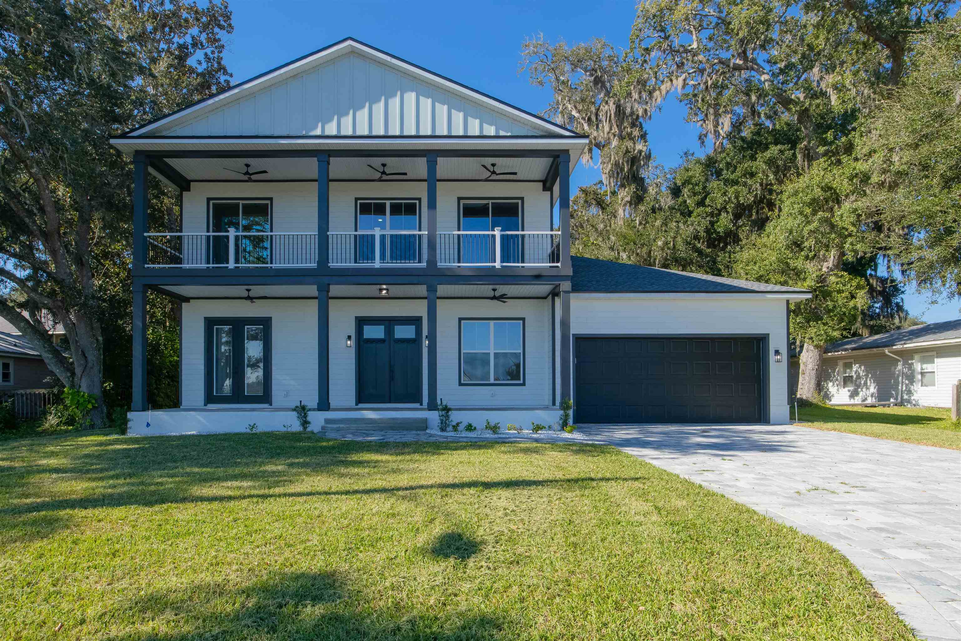 132 Terrapin Road St. Augustine, FL 32086 - Photo 9 of 95 a front view of a house with a yard