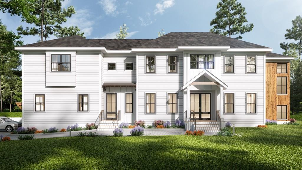 68 Freemont Street Lexington, MA 02421 - Photo 1 of 11 a front view of a house with a yard
