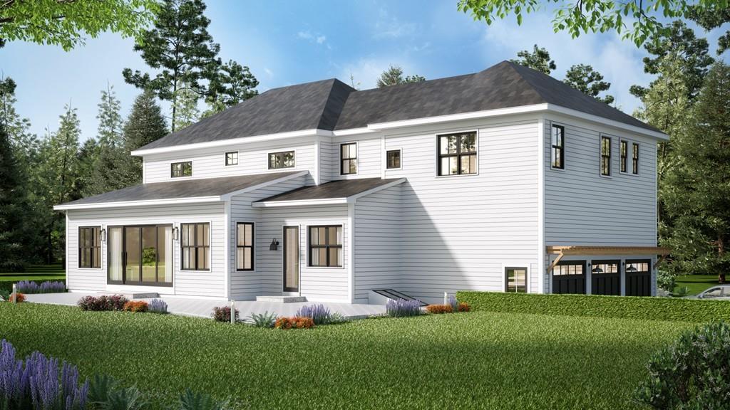 68 Freemont Street Lexington, MA 02421 - Photo 2 of 11 a front view of a house with a garden and yard